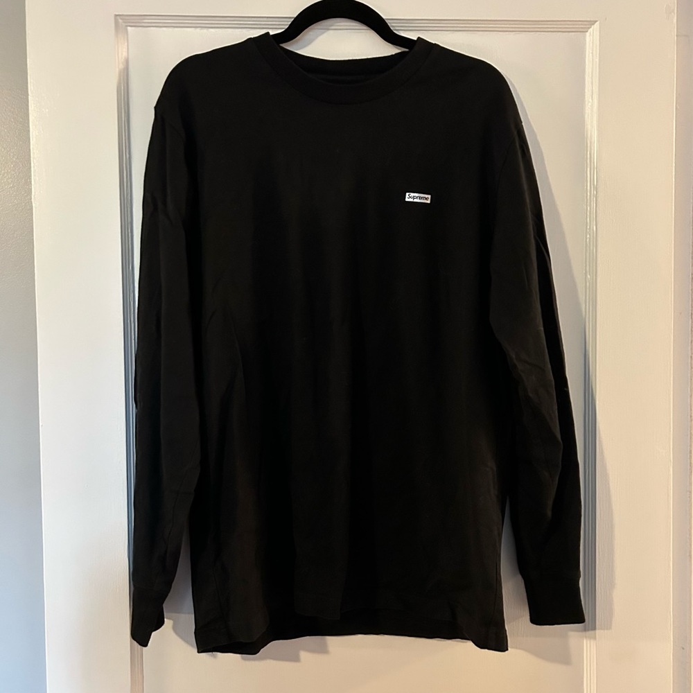 Supreme long sleeve black tee with silver metallic logo